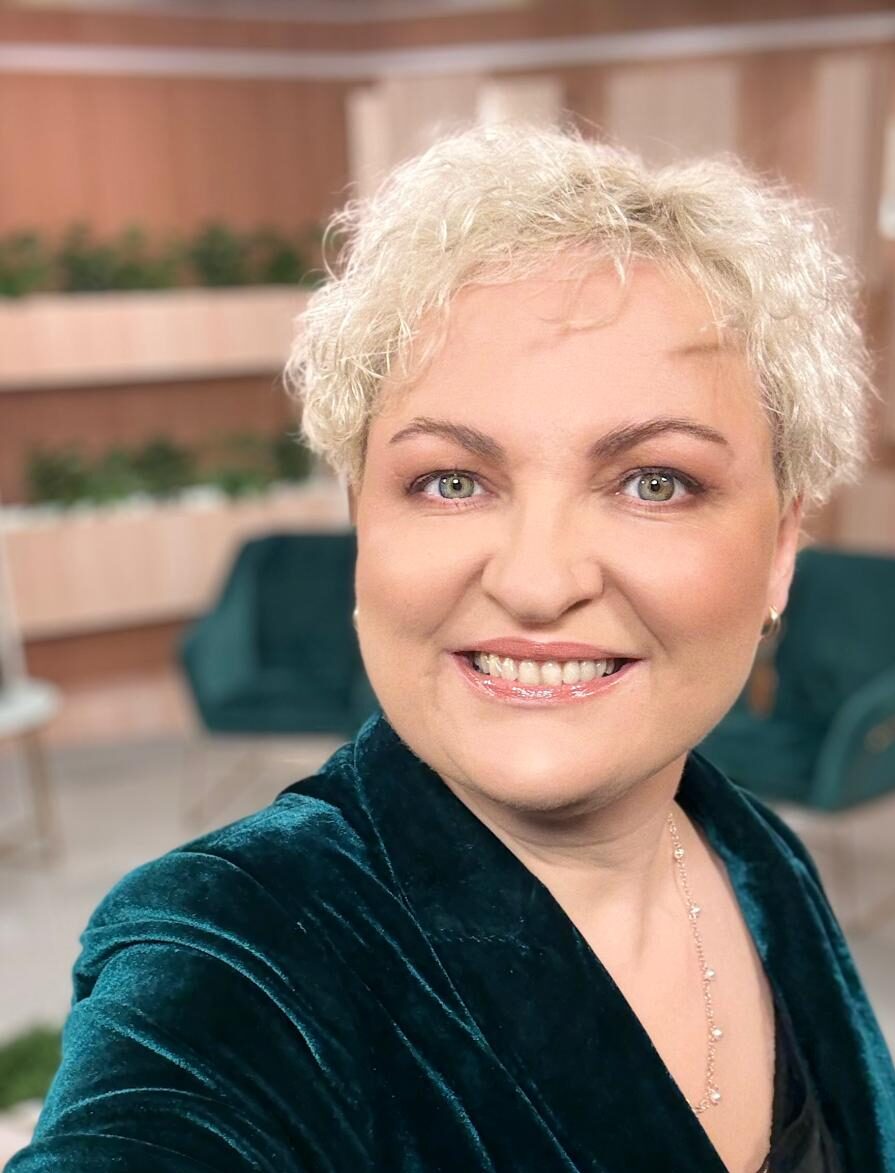 Aigas Veckalnes portretfoto.